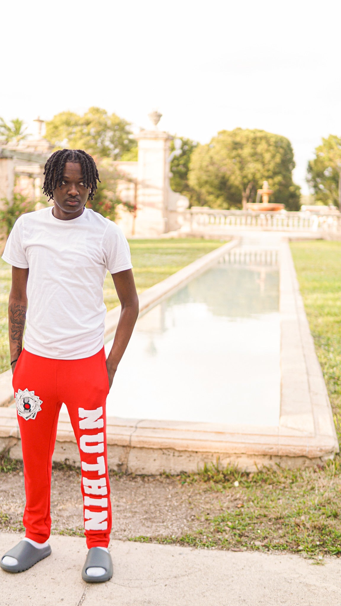 "US NEVER THEM" Red Varsity Sweats