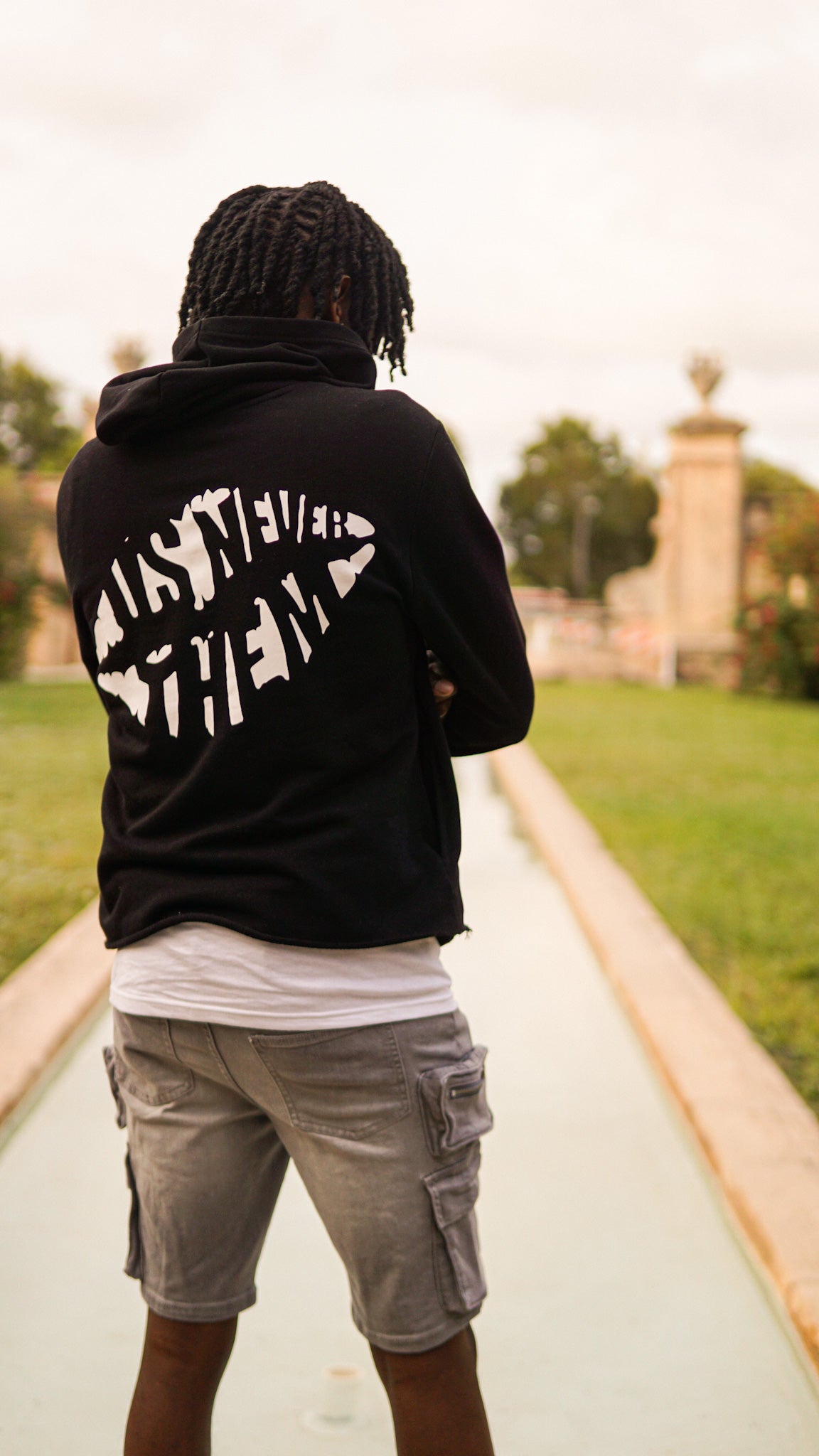 "US NEVER THEM" Black Cropped Hoodie
